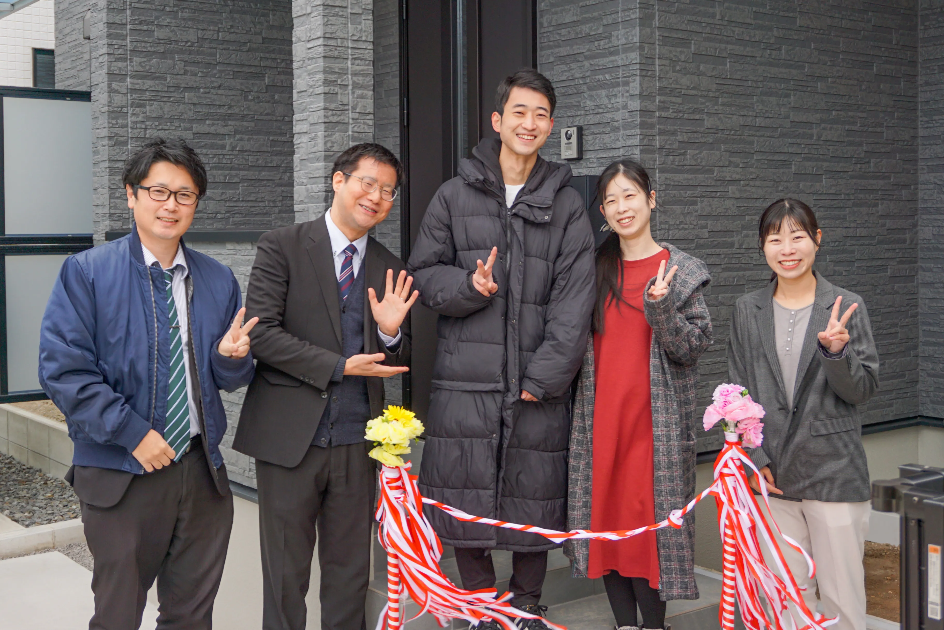 お施主様とスタッフ